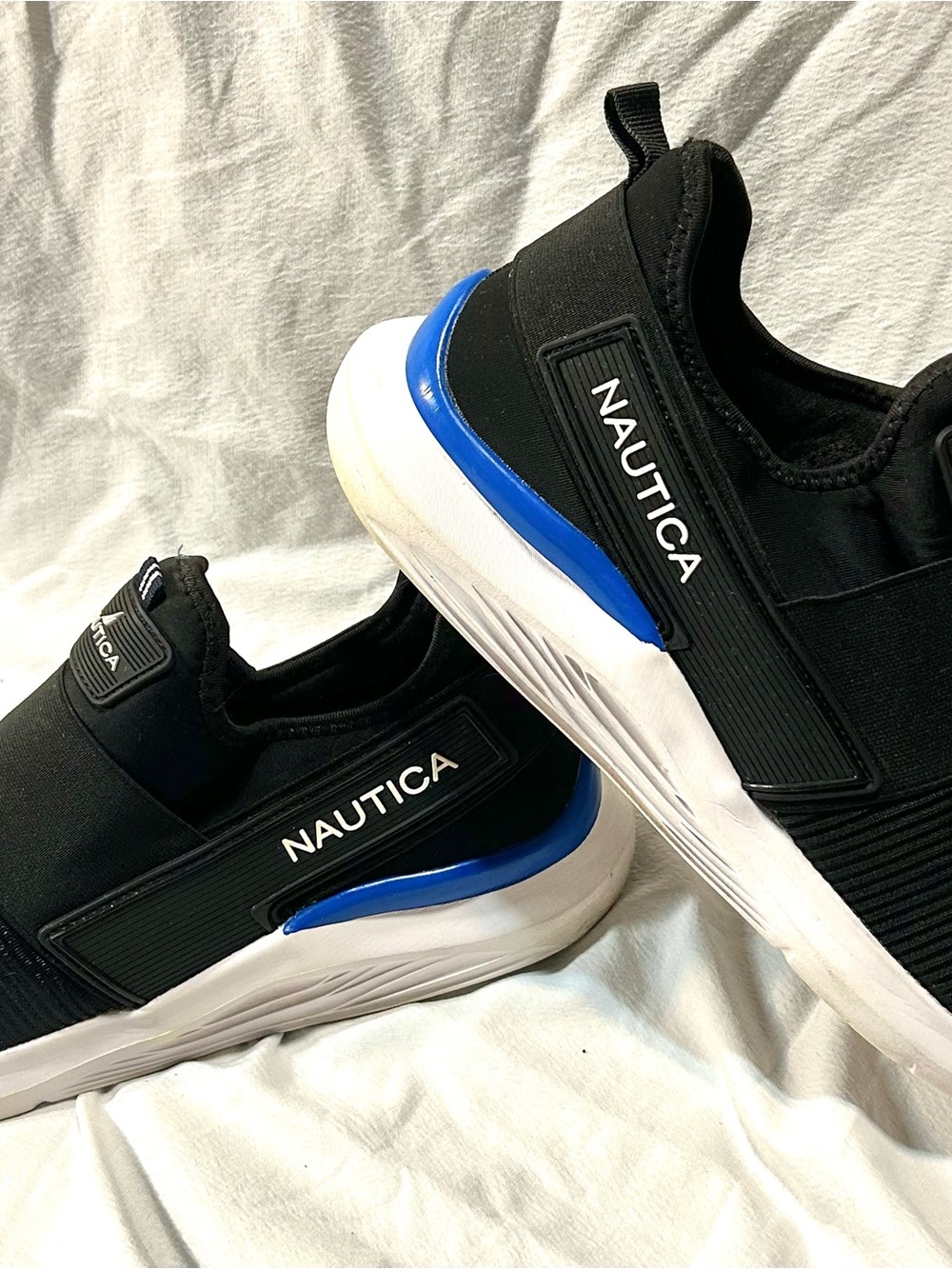 Nautica Men's Black Slip-On Sneakers with Blue Heel Accent